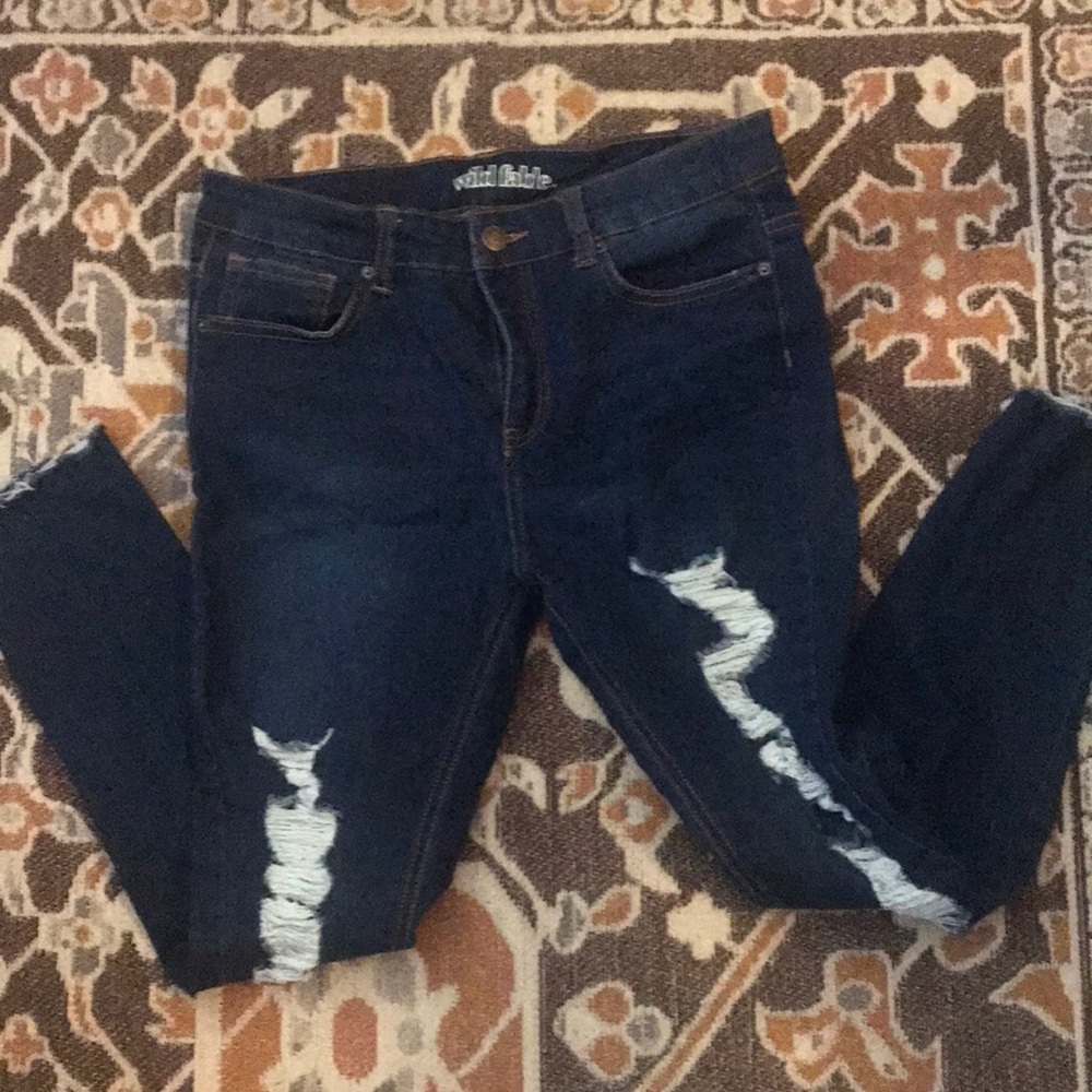 High rise, raw edge distressed skinny jeans